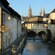 The streets of Bayeux and a flowing river